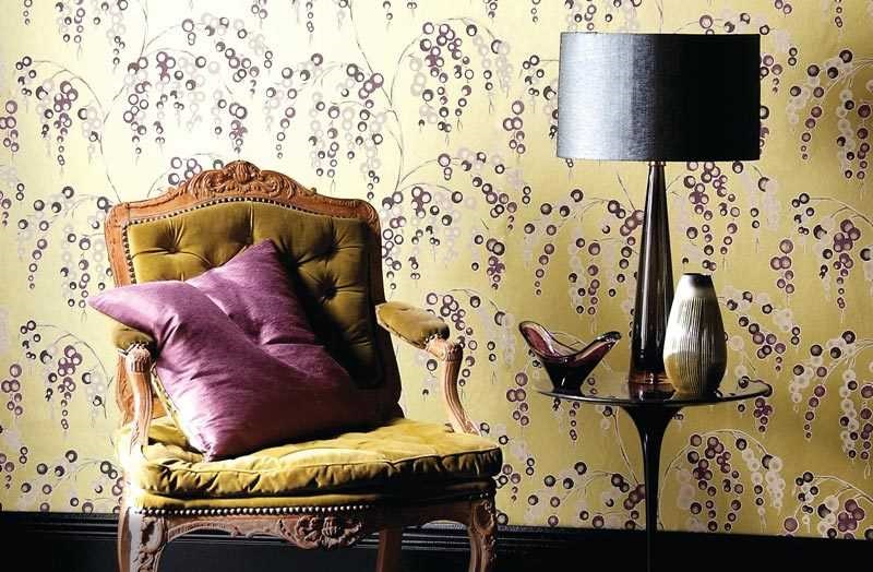 Floral wallpaper and provence armchair