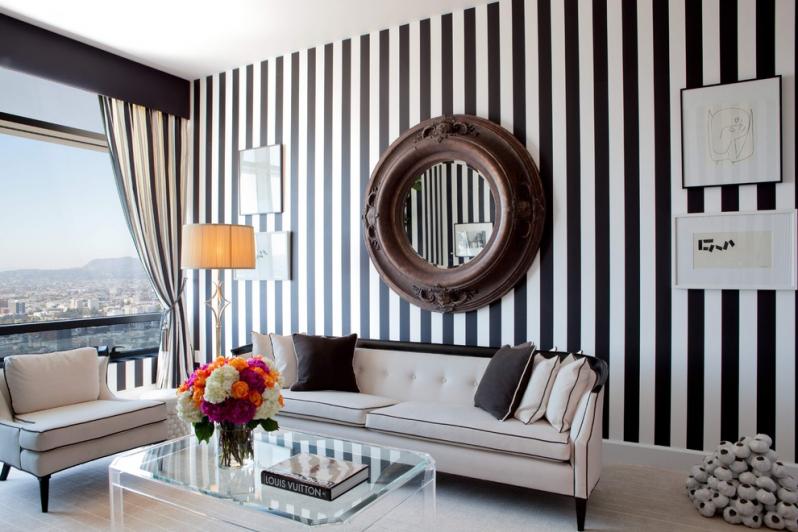 Interior of a classic living room with striped wallpaper