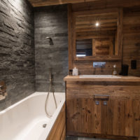 Natural wood in the design of the bathroom