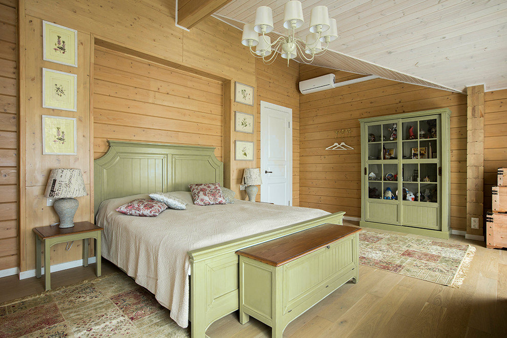 Design bedroom with olive furniture and wooden walls
