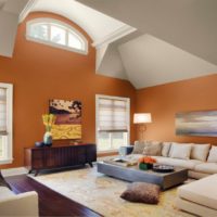 Orange walls in a high ceiling room