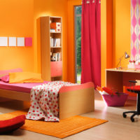 Bright orange shades in the design of the bedroom