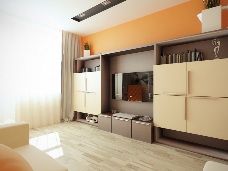 La combinazione di arancione e beige nel design del soggiorno