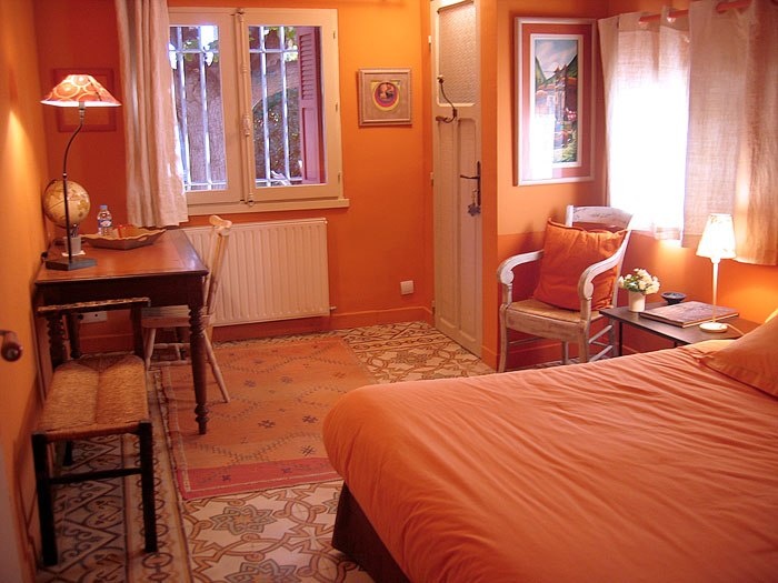 Orange Provence style bedroom interior