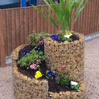 DIY flowerbed of gabions