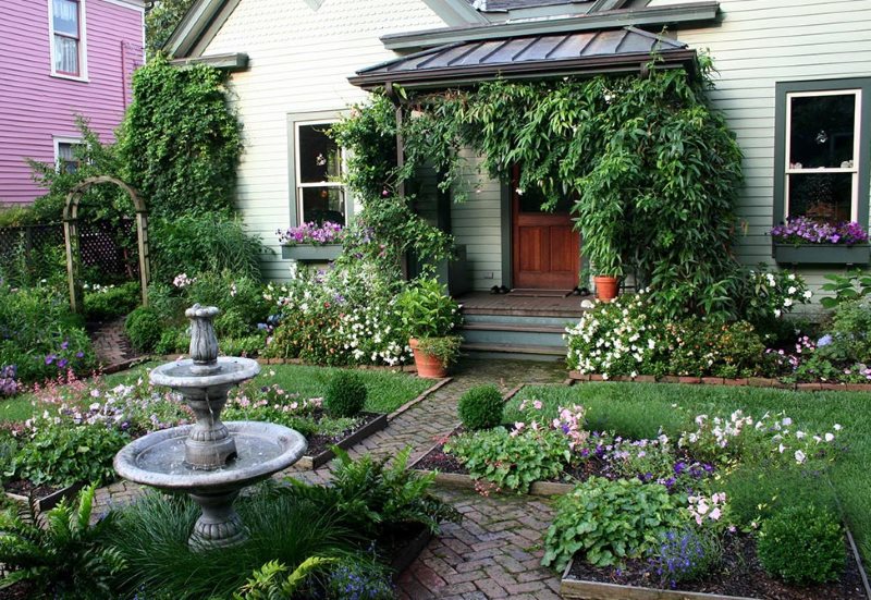 Small garden in front of a French-style house