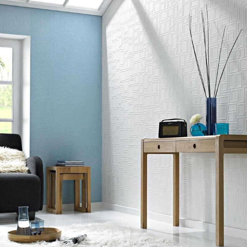 White and blue wall with tinted wallpaper