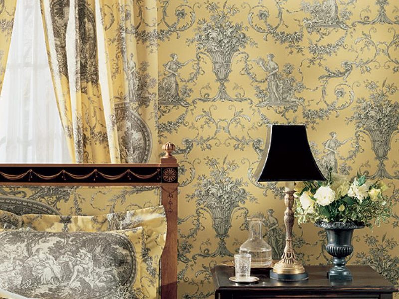 Wall in the living room with textile wallpaper.