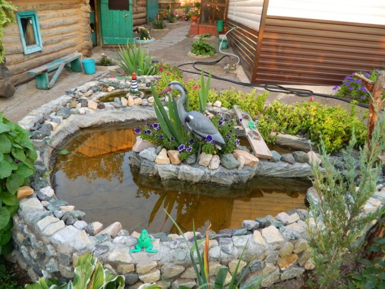 Small artificial pond in the courtyard of a private house