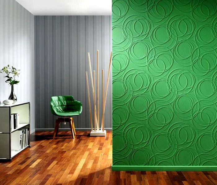 Green wall with embossed wallpaper for painting