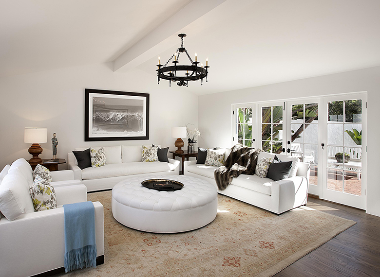 Interior of a beautiful living room of a country house in white