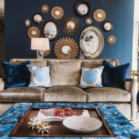 Decorative mirrors above the sofa in the living room