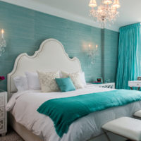 White bed in a turquoise bedroom