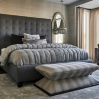 Black bed in the gray bedroom