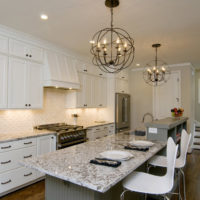 Stylish chandeliers in the living room kitchen