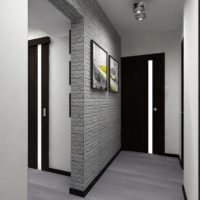 Imitation of gray brick in the interior of the hallway