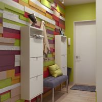 The original design of the hallway wall with multi-colored planks