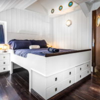Nautical-style bed with drawers