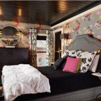 Floral wallpaper in a room with a dark ceiling