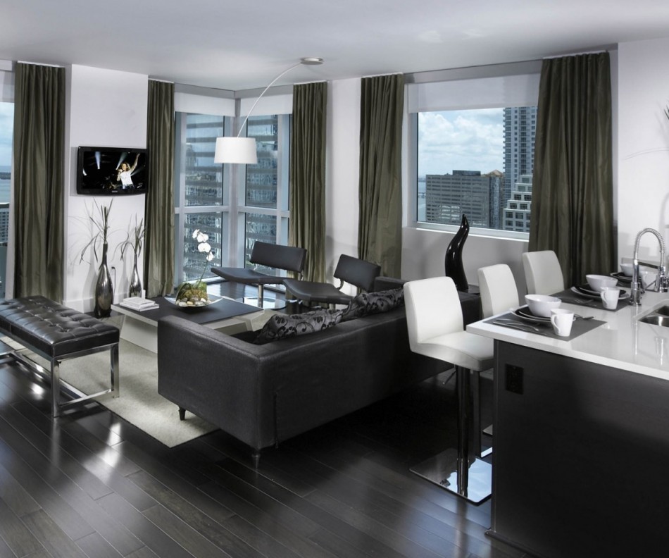 Cucina-soggiorno ad alta tecnologia in un appartamento di un edificio a più piani