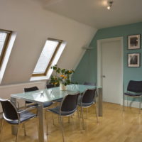 Mint color in the interior of the room with uneven walls