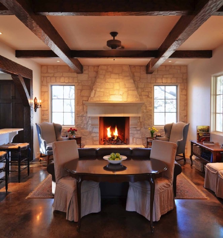 Dining table in the living room with fireplace