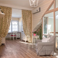 Zoning of a children's room with curtains