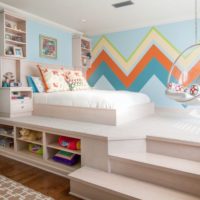 Zoning a kids room with a podium