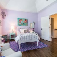 Lilac walls in the room for a teenage girl