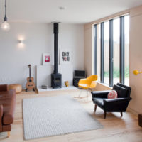 Minimalist living room with brown sofa