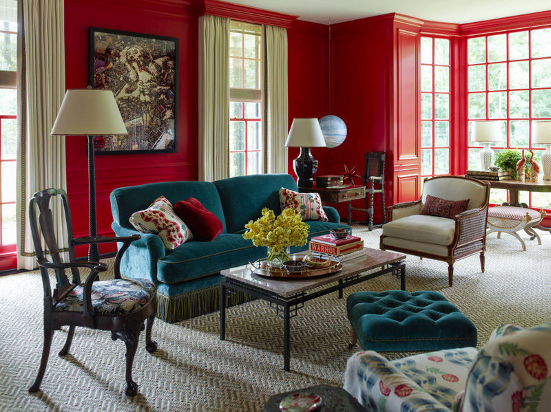 Red wall in the interior of the living room of a country house