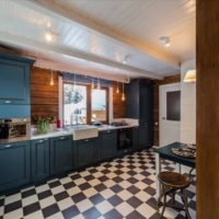 Ceramic checkered floor in the kitchen of a private house