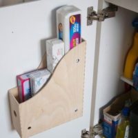 Storage of small things on the cabinet door