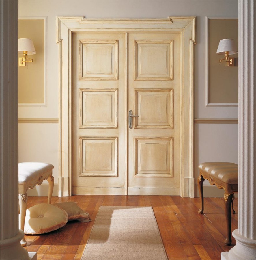 Cream-colored wooden door in a classic living room