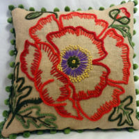 Burlap pillow with embroidery for interior decor