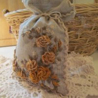 Burlap sack with thread roses
