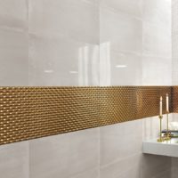 Golden mosaic in a modern bathroom