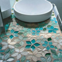 Countertop with mosaic pressed into concrete