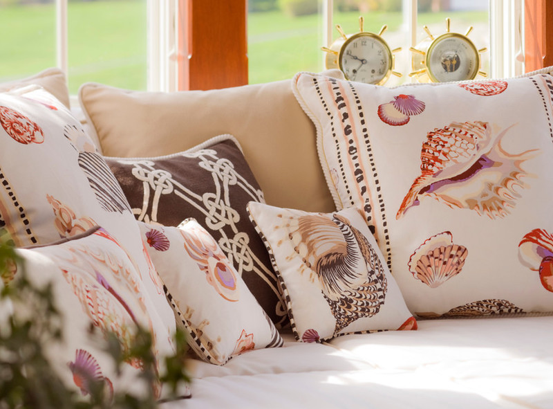 Decorative pillows with images of seashells
