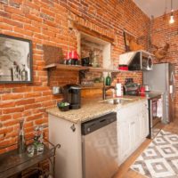 Red brick wall in the kitchen of a private house