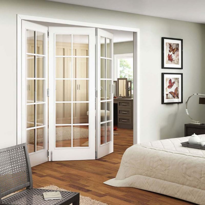 Bright folding doors in the interior of the bedroom