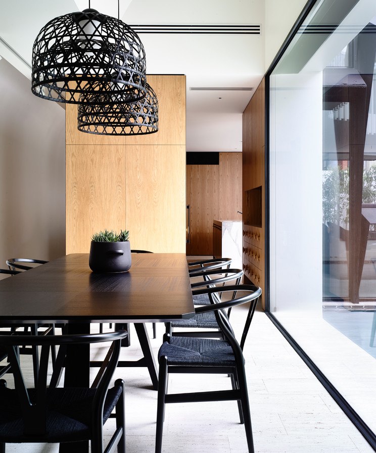 Wicker lampshades of kitchen fixtures in contemporary style