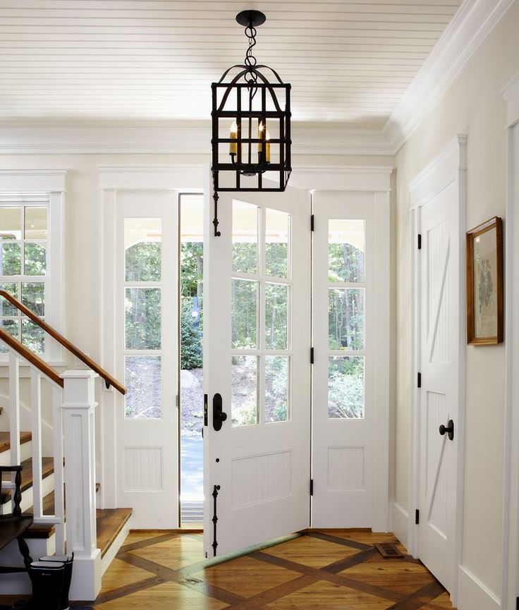 Black lamp in a bright hallway of a country house