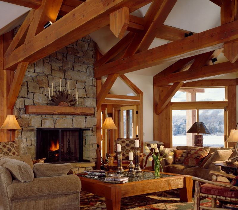 Wooden beams in the design of the living room of a private house