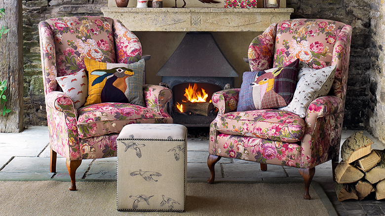 Beautiful armchairs in the living room with fireplace