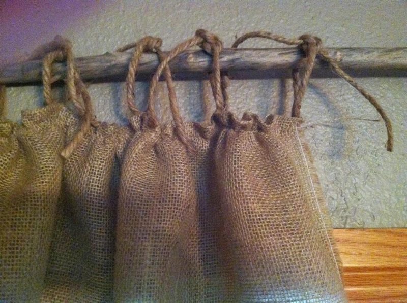 Hanging burlap curtains on rope loops