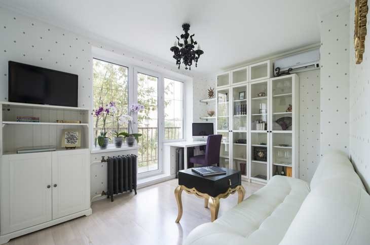 White living room interior with black tv