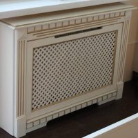 Decorative box for heating radiator with simulated fireplace portal