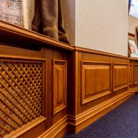 Decorative finishes for heating from solid wood