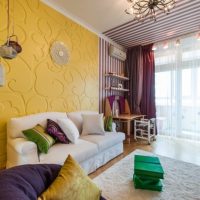 Wall decoration over the sofa in yellow